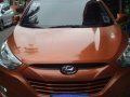 Orange Hyundai Tucson 2013 at 40000 km for sale -3