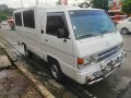 Selling White Mitsubishi L300 2008 Van in Quezon City -1