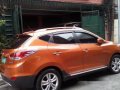 Orange Hyundai Tucson 2013 at 39125 km for sale-0