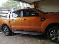 Orange Ford Ranger 2016 Automatic Diesel for sale in Manila-3