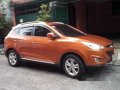Orange Hyundai Tucson 2013 at 39125 km for sale-0