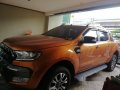 Orange Ford Ranger 2016 Automatic Diesel for sale in Manila-6