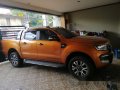 Orange Ford Ranger 2016 Automatic Diesel for sale in Manila-7