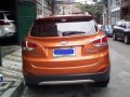 Orange Hyundai Tucson 2013 at 39125 km for sale-2