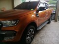 Orange Ford Ranger 2016 Automatic Diesel for sale in Manila-4