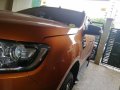 Orange Ford Ranger 2016 Automatic Diesel for sale in Manila-5