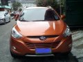 Orange Hyundai Tucson 2013 at 39125 km for sale-3