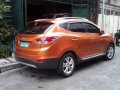 Orange Hyundai Tucson 2013 at 39125 km for sale-1