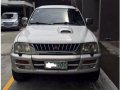 White Mitsubishi Strada 2001 for sale in Quezon City-0