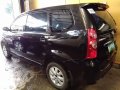 Black Toyota Avanza 2010 at 129000 km for sale in Antipolo-1