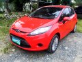 Red Ford Fiesta 2012 at 35000 km for sale -0