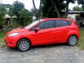 Red Ford Fiesta 2012 at 35000 km for sale -1
