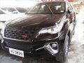 Sell Black 2016 Toyota Fortuner at 6000 km-1