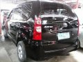 Selling Black Toyota Avanza 2009 in Manila-1