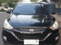 Selling Hyundai Tucson 2012 Automatic Gasoline in San Juan-5