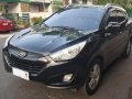Selling Hyundai Tucson 2012 Automatic Gasoline in San Juan-1