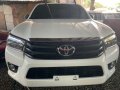 White Toyota Hilux 2016 Manual Diesel for sale in Quezon City-3