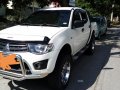 Selling Mitsubishi Strada 2014 Truck in Cavite -2