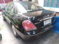 Black Nissan Sentra 2004 at 100000 km for sale in Parañaque-1