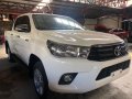 Selling White Toyota Hilux 2016 in Quezon City-1