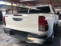 Selling White Toyota Hilux 2016 in Quezon City-0