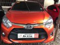 Orange Toyota Wigo 2019 Manual Gasoline for sale in Quezon City-2