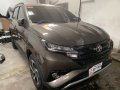 Selling Brown Toyota Rush 2019 in Quezon City-1