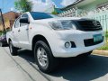 White 2013 Toyota Hilux Truck at 60000 km for sale -0