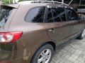 Brown Hyundai Santa Fe 2010 for sale in Quezon City -3