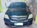 Black Honda City 2006 at 72000 km for sale -0