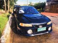 Selling Blue Mitsubishi Lancer 1999 in Quezon City -0