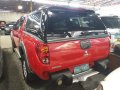 Red Mitsubishi Strada 2013 at 79025 km for sale in Quezon City-0