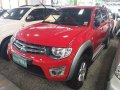 Red Mitsubishi Strada 2013 at 79025 km for sale in Quezon City-2