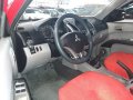 Red Mitsubishi Strada 2013 at 79025 km for sale in Quezon City-6