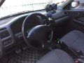 Selling 2nd Hand Mazda 323 Sedan in Laguna -4