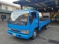 Blue Isuzu Elf 2006 Truck at 100000 km for sale -1
