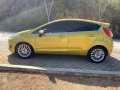 Yellow Ford Fiesta 2016 Hatchback Automatic Gasoline for sale in Manila-4