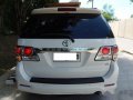 Selling White Toyota Fortuner 2014 Automatic Gasoline in Manila-1