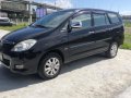 Black Toyota Innova 2011 at 85000 km for sale -1