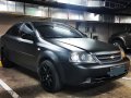 Black 2006 Chevrolet Optra at 99000 km for sale -5