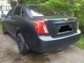 Black 2006 Chevrolet Optra at 99000 km for sale -4