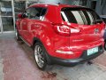 Red 2012 Kia Sportage at 61000 km for sale in Metro Manila -2