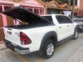 Selling White Toyota Hilux 2017 in Quezon City-0