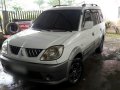 Selling White Mitsubishi Adventure 2005 at 82000 km in Davao City -2