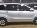 Silver 2013 Toyota Avanza for sale in Quezon City -2