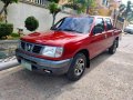 Red 2005 Nissan Frontier at 120000 km for sale in Cebu -0