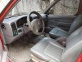 Red 2005 Nissan Frontier at 120000 km for sale in Cebu -1