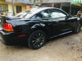Black Ford Mustang 1999 at 50000 km for sale -0