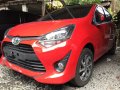 Selling Red Toyota Wigo 2018 at 2000 km in Quezon City -0