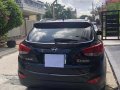 Selling Black Hyundai Tucson 2011 at 62000 km -4